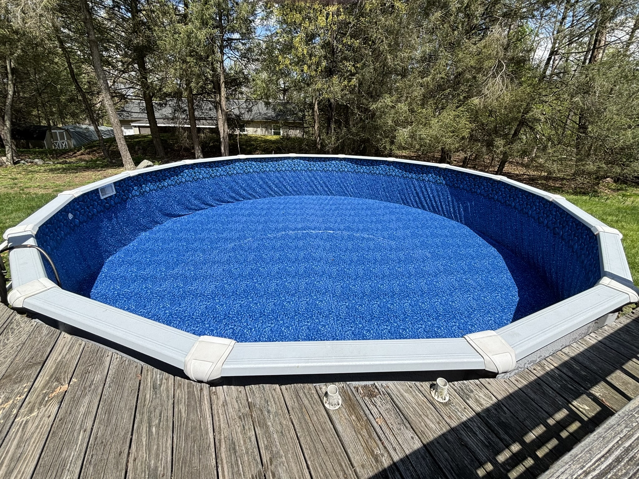 Pool Patrol Pros crew installing an above-ground pool